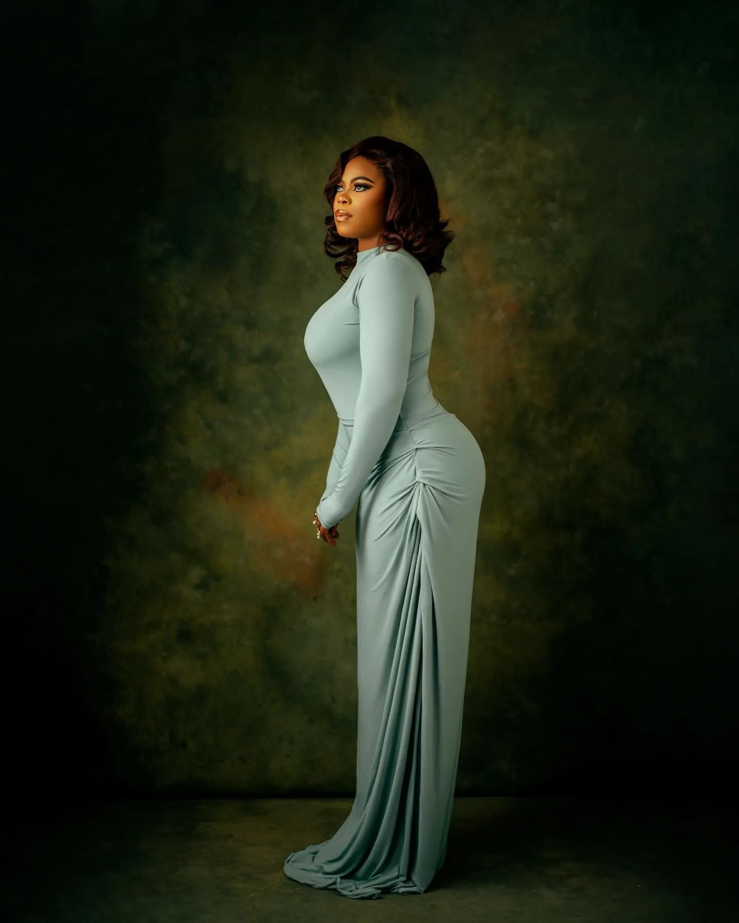 Profile view of the sage dress