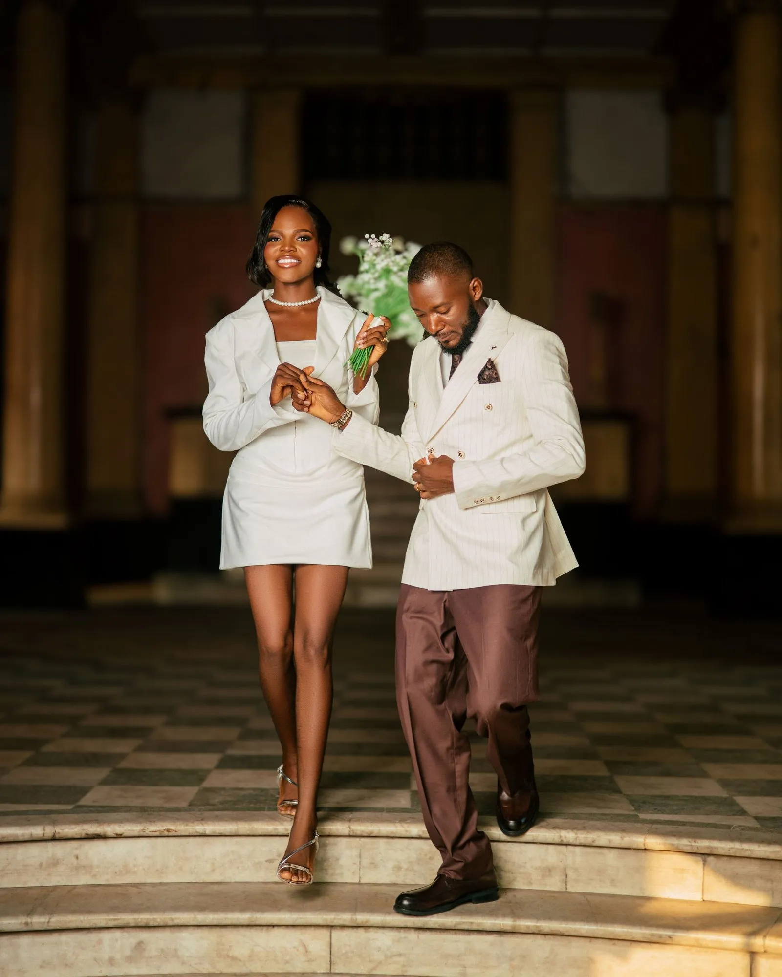 Couple walking down the steps together