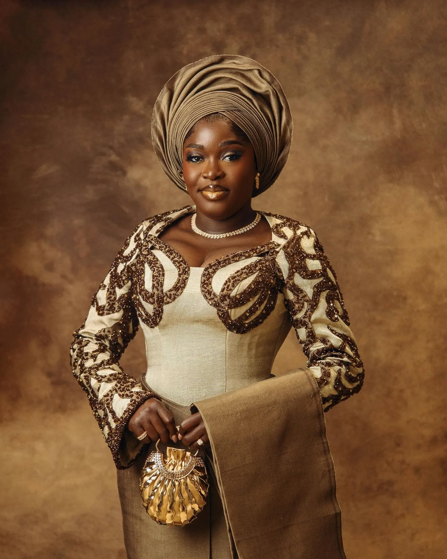 Bride with a hand on her hip, smiling