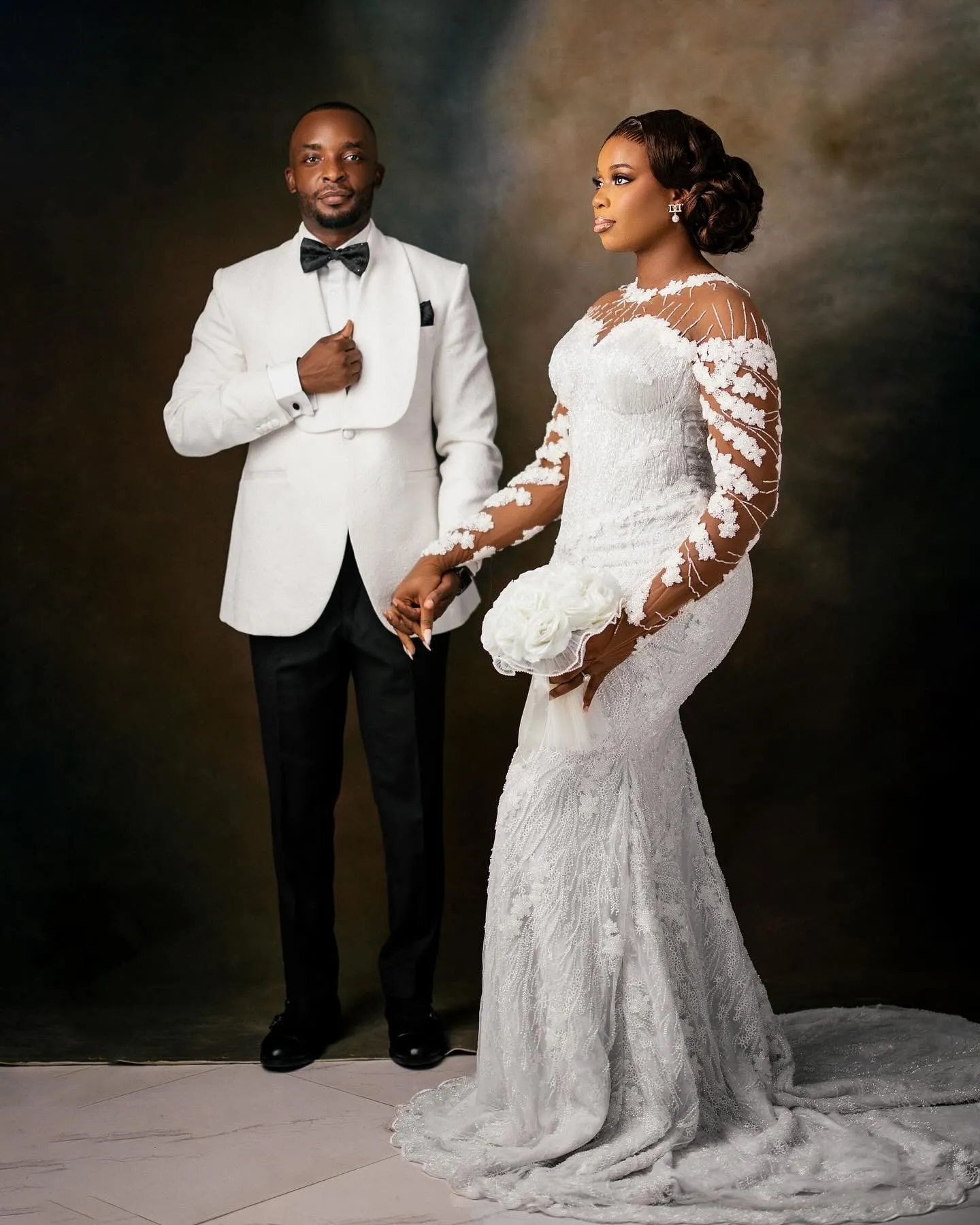 Couple standing full length, side by side